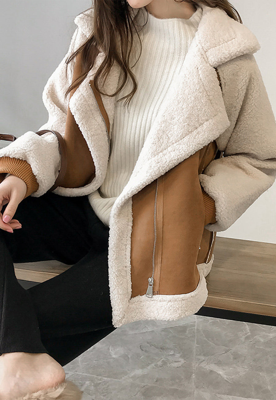 Chaqueta de lana con mangas de piel de oveja