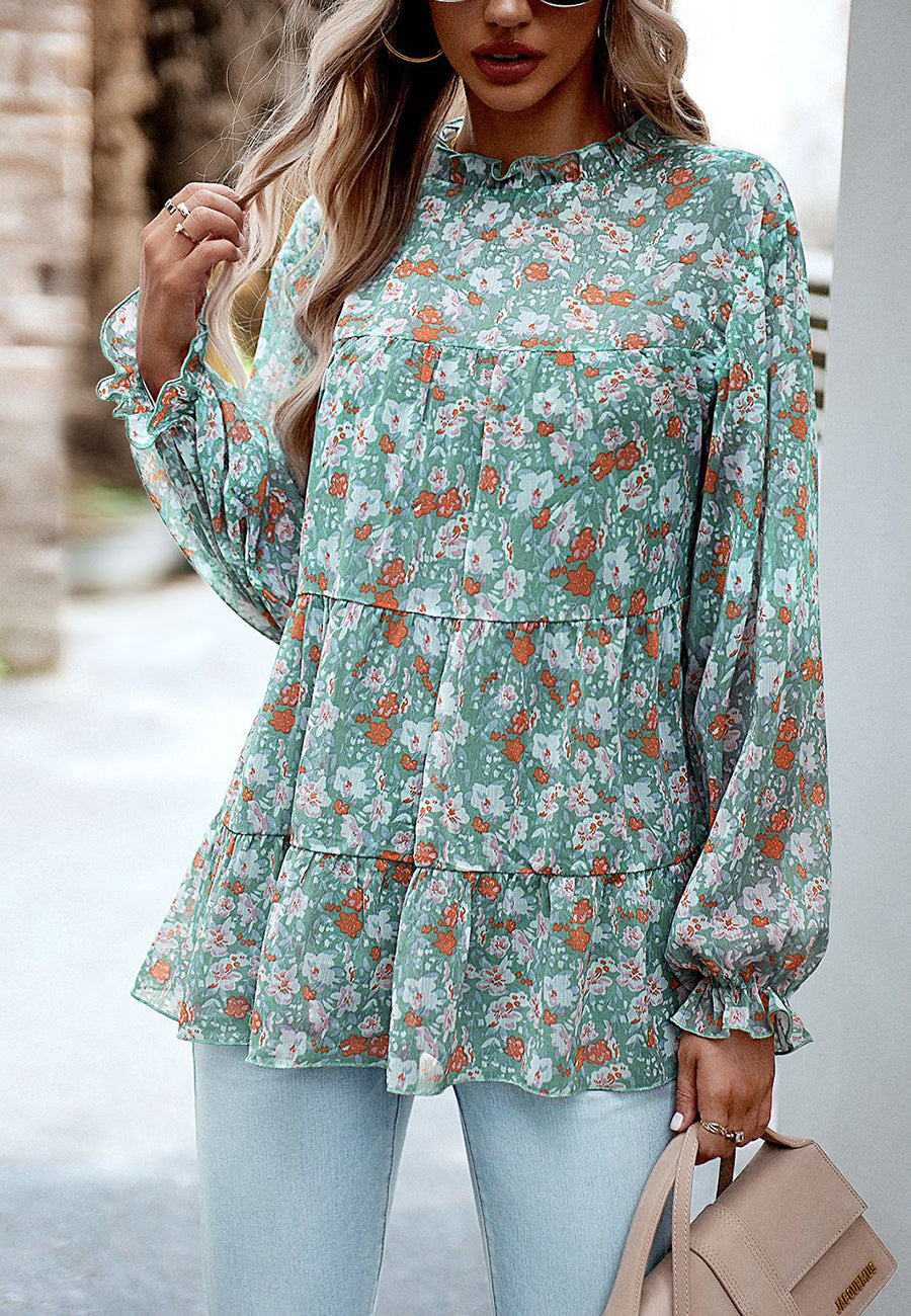 Blusa con volantes y flores en capas
