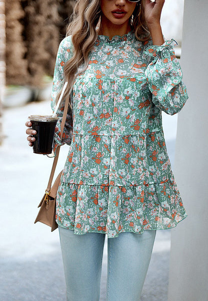 Blusa con volantes y flores en capas