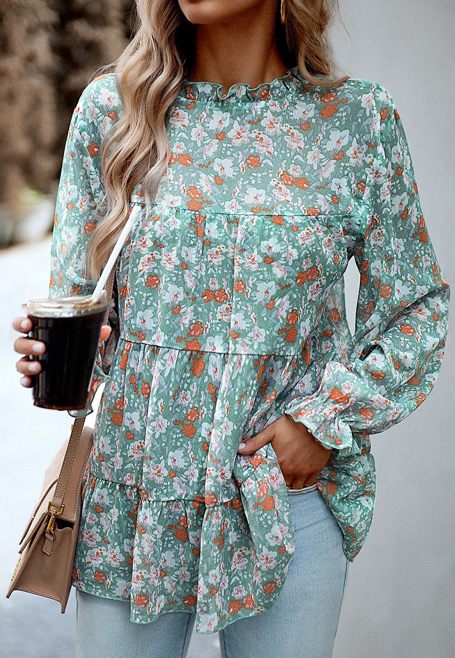 Blusa con volantes y flores en capas