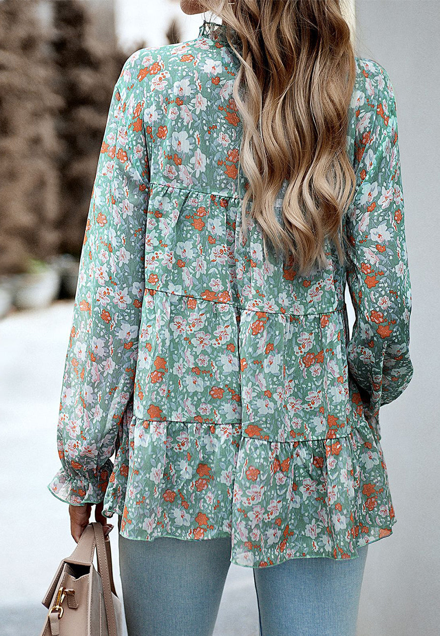 Blusa con volantes y flores en capas