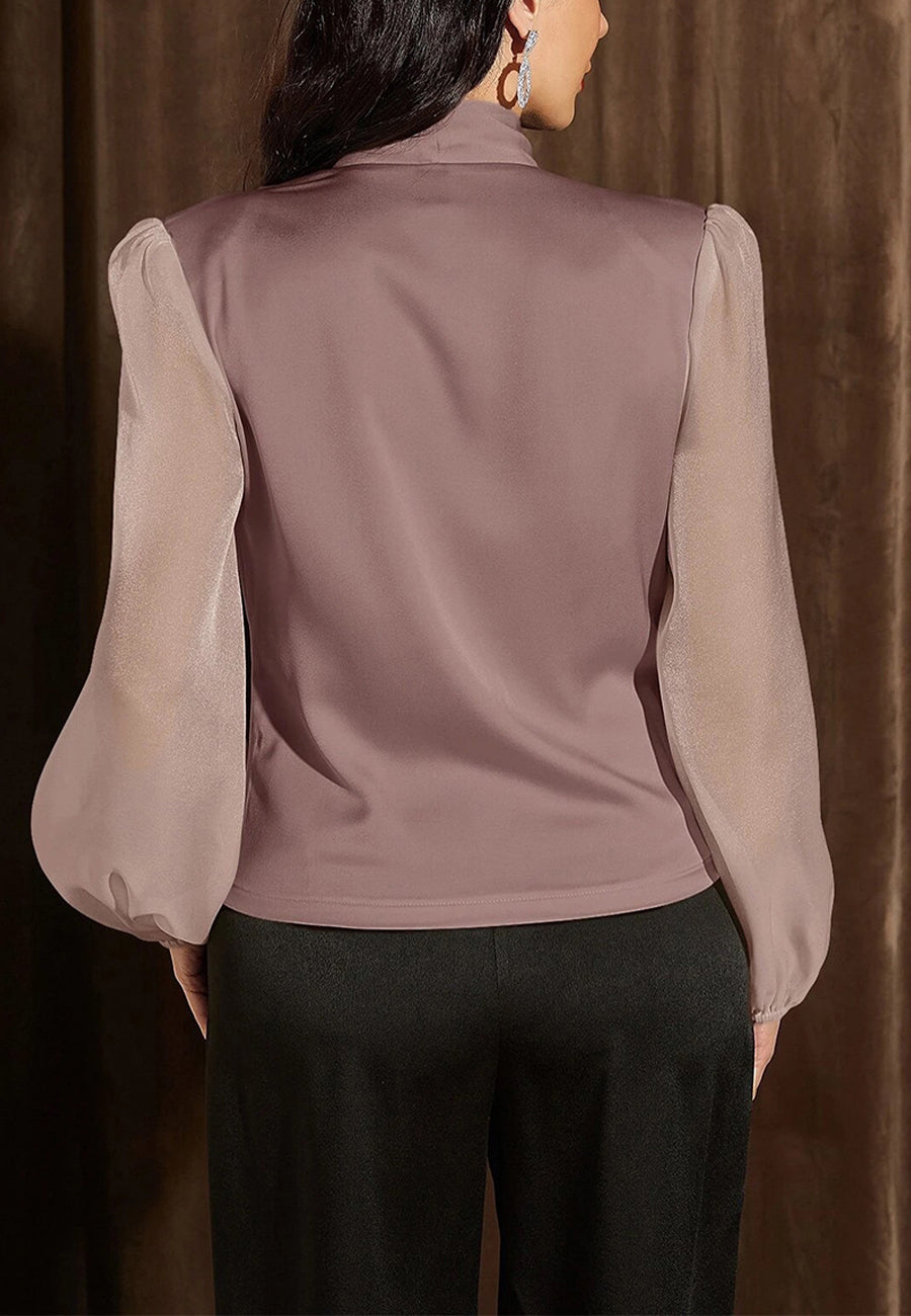 Blusa clásica con cuello cruzado y mangas de obispo