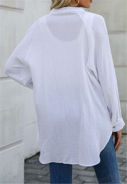 Blusa con botones y mangas holgadas