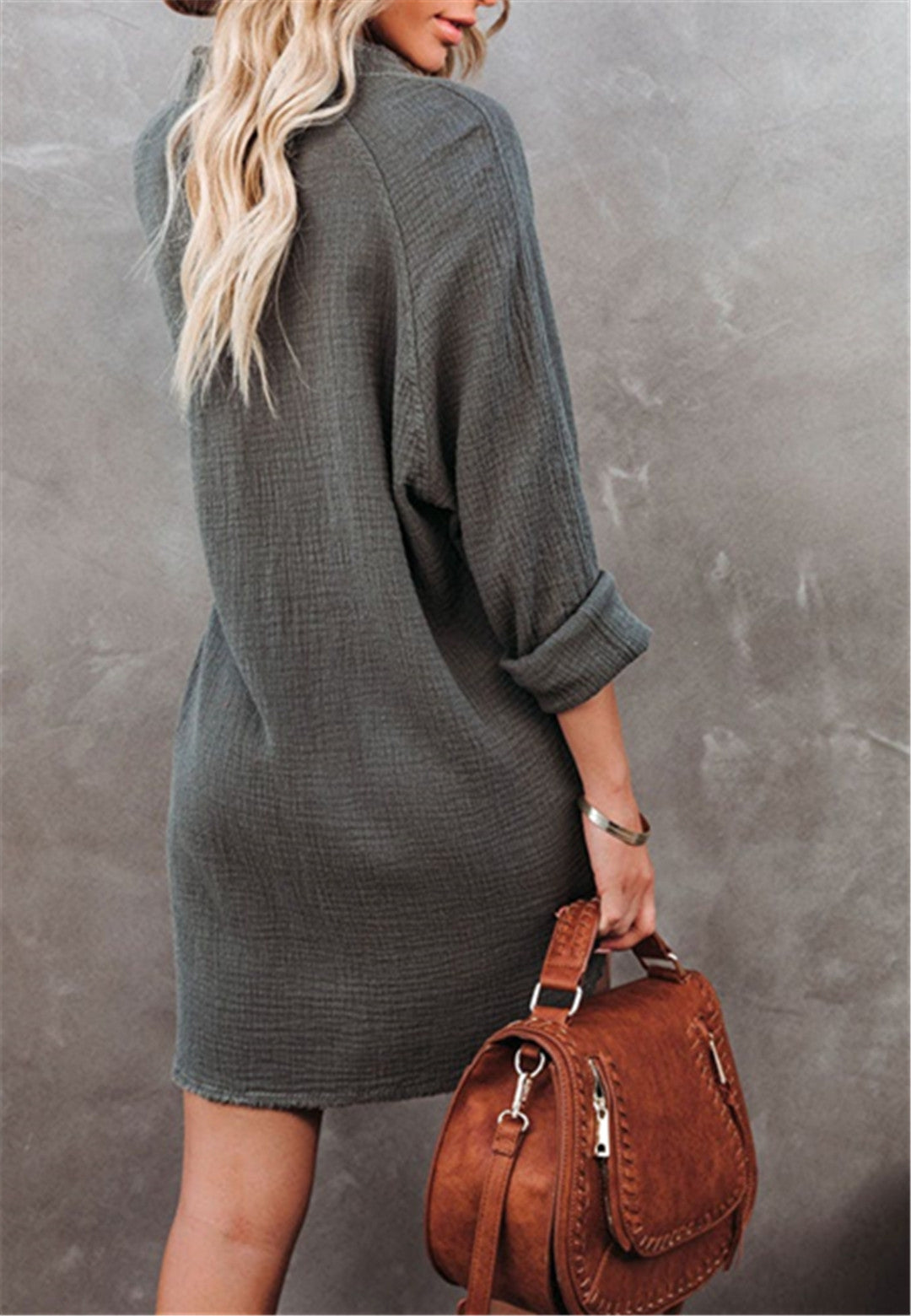 Blusa con botones y bolsillos laterales dobles