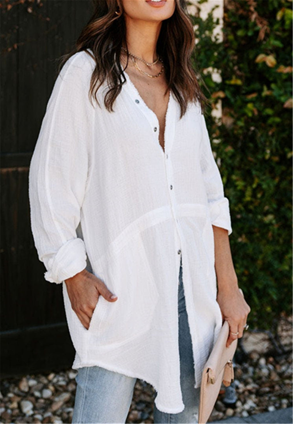 Blusa con botones y bolsillos laterales dobles