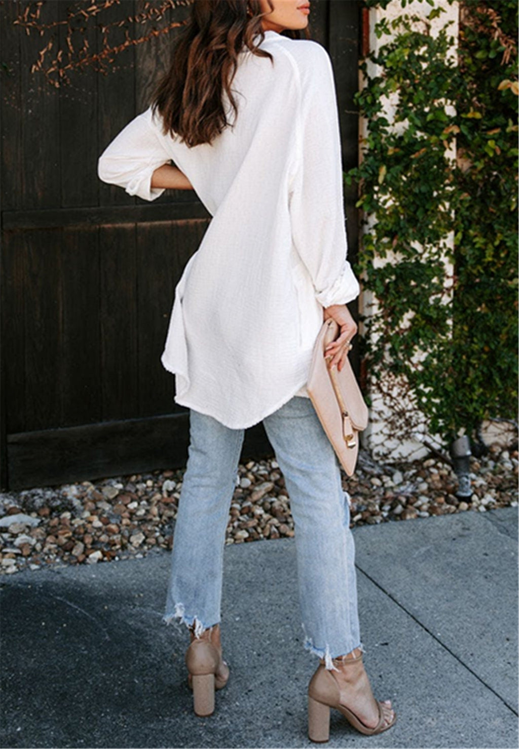 Blusa con botones y bolsillos laterales dobles