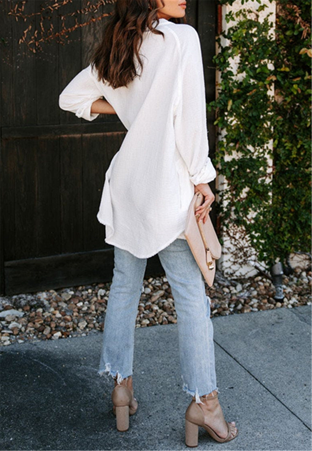 Blusa con botones y bolsillos laterales dobles