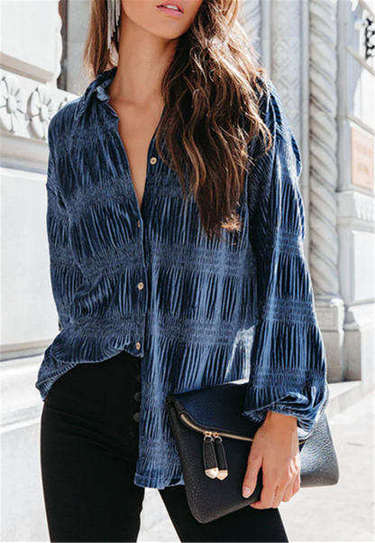 Blusa con botones y mangas globo