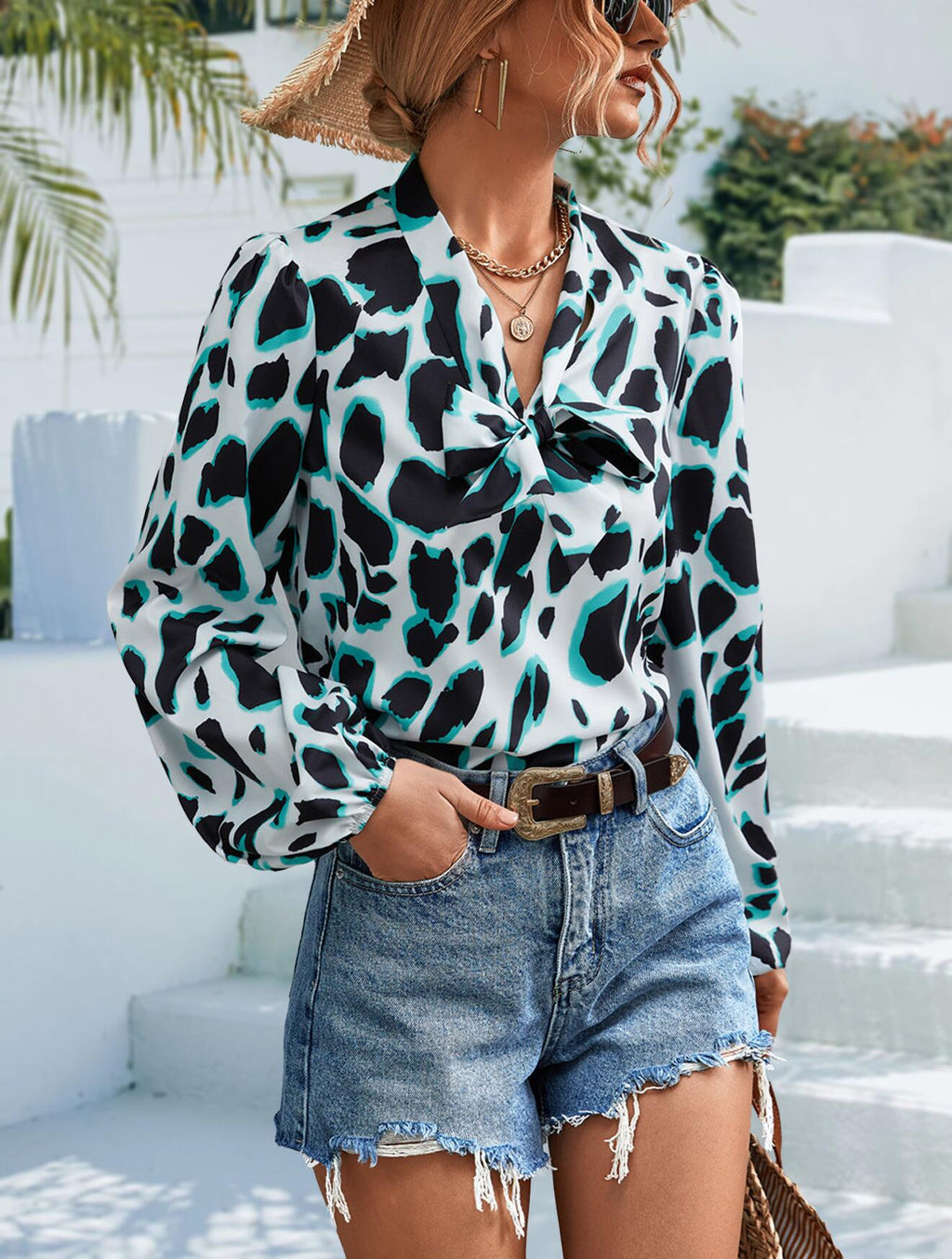 Blusa de manga larga con escote en V y lazo