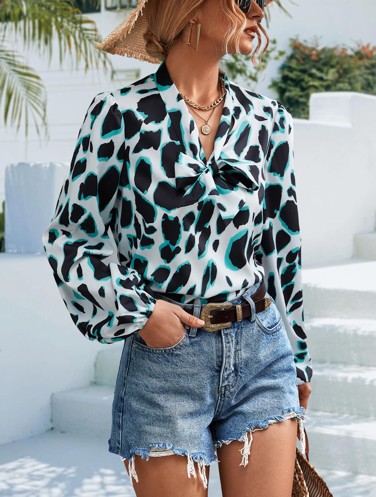 Blusa de manga larga con escote en V y lazo