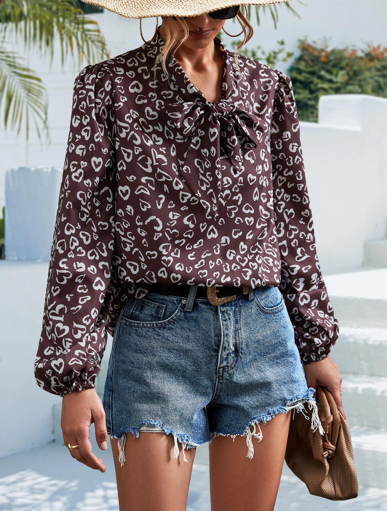 Blusa de manga larga con escote en V y lazo