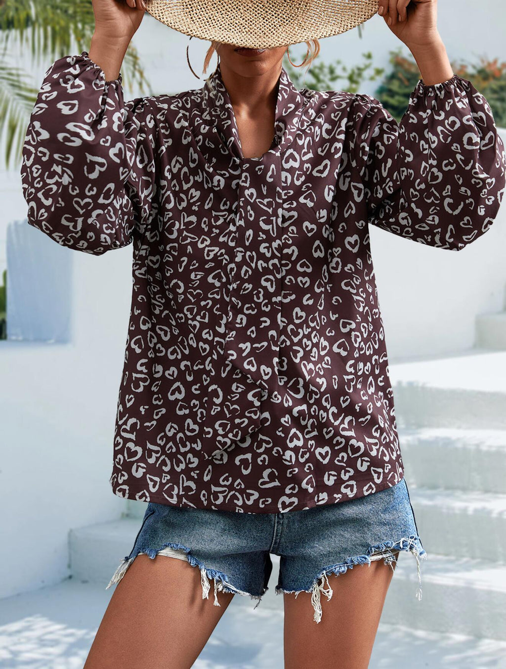 Blusa de manga larga con escote en V y lazo