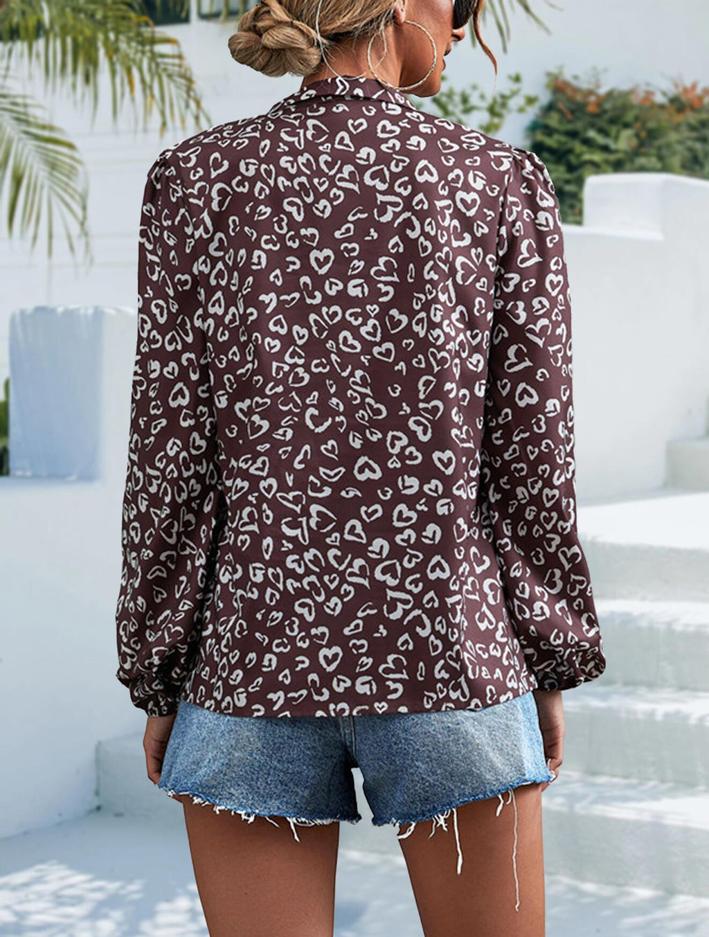 Blusa de manga larga con escote en V y lazo
