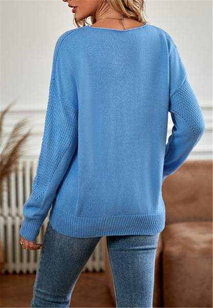 Suéter con detalles texturizados en color liso