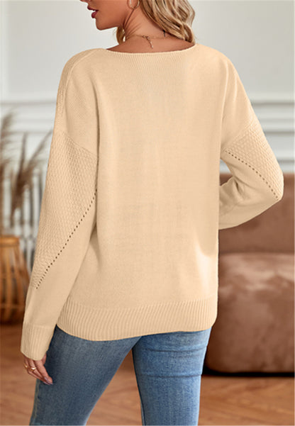 Suéter con detalles texturizados en color liso