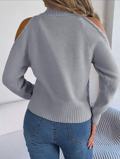 Suéter de punto con cuello alto y hombros descubiertos