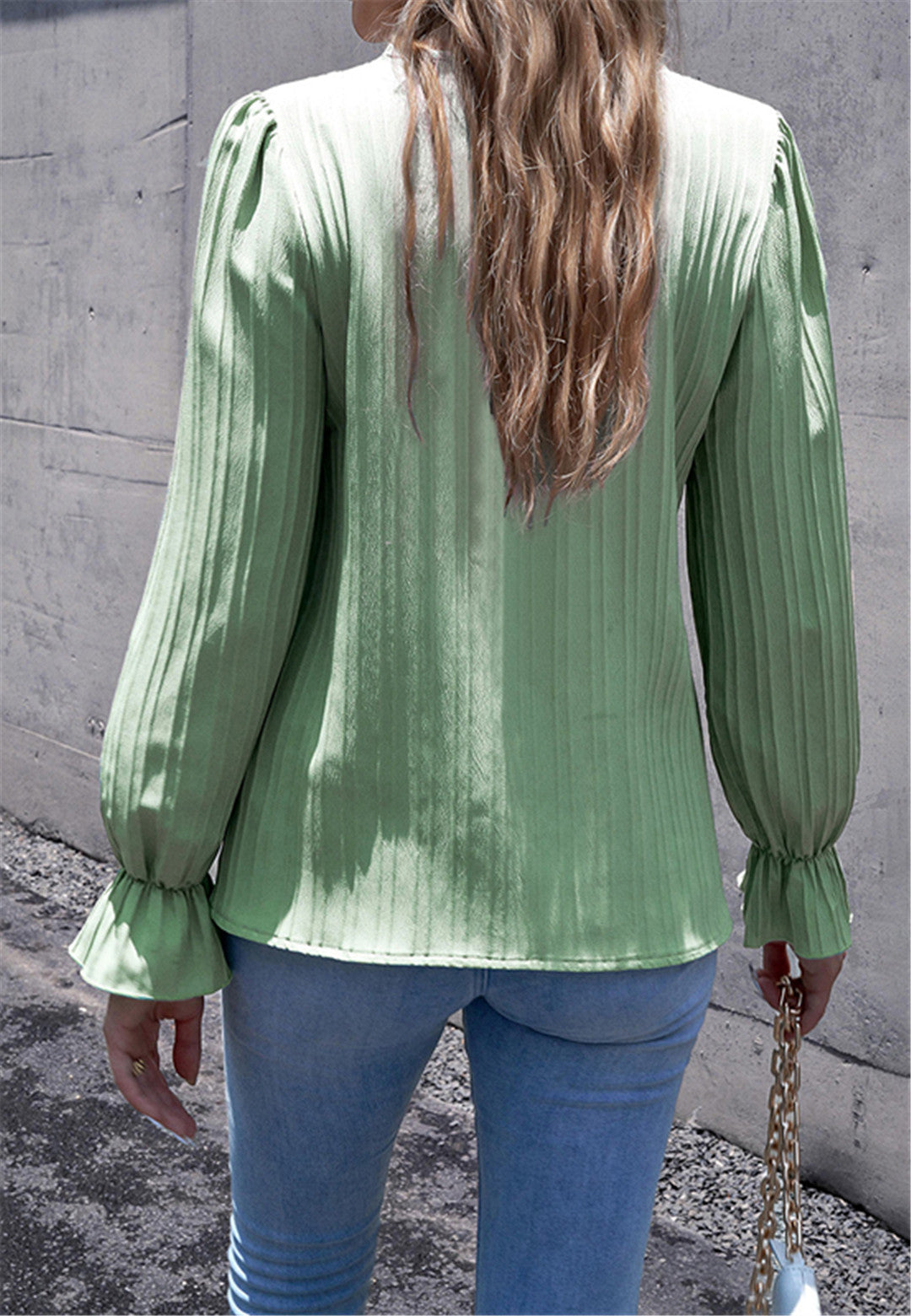 Blusa de rayas texturizadas con ribete de encaje