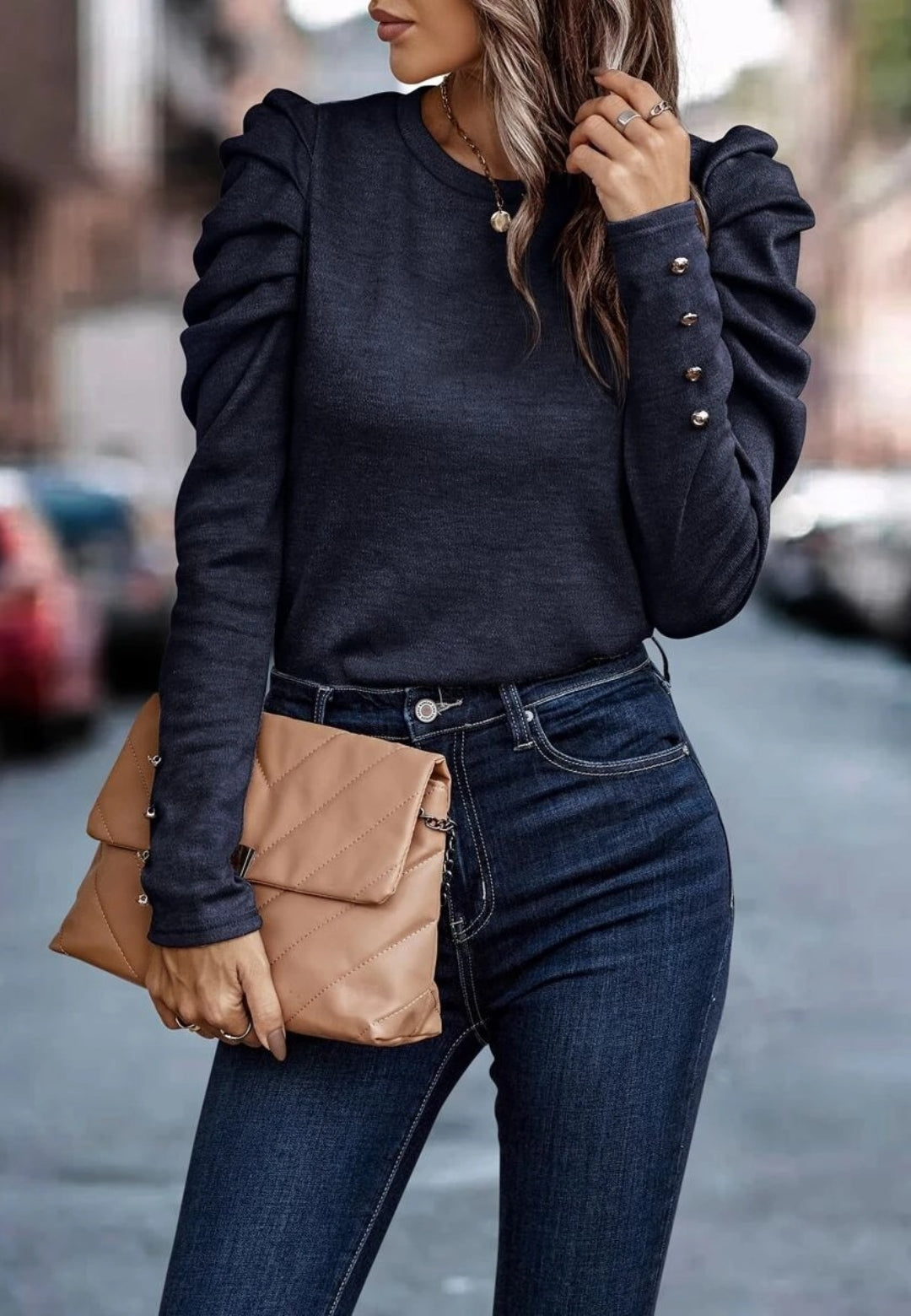 Blusa plisada con mangas gigot