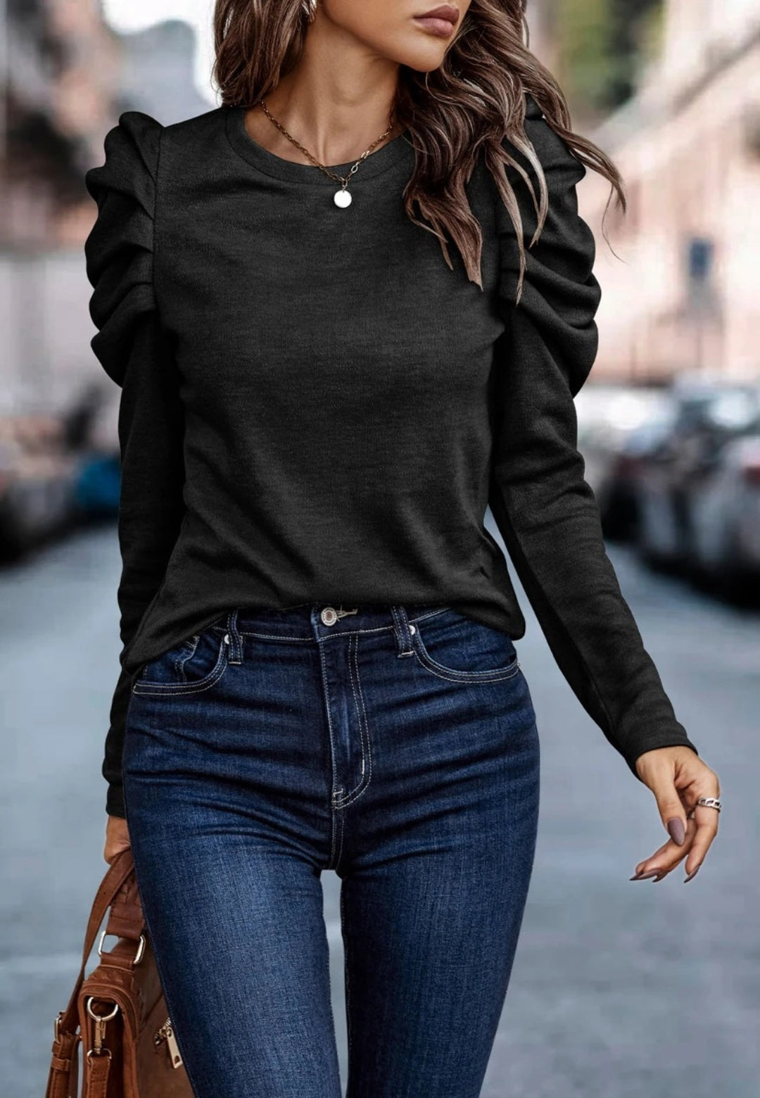 Blusa plisada con mangas gigot