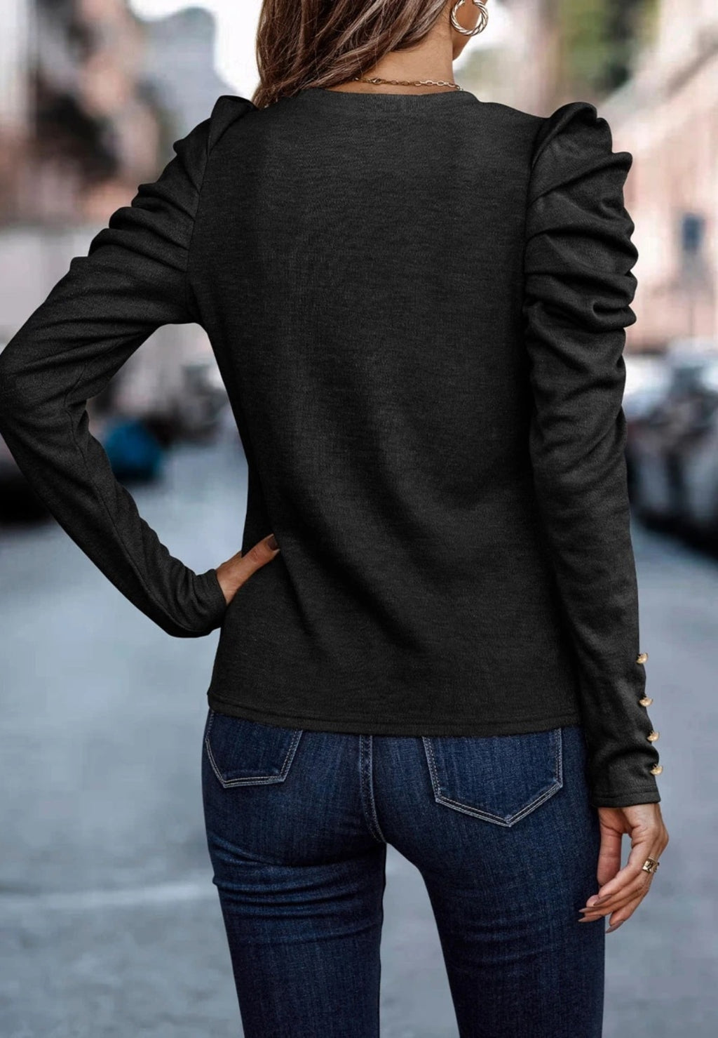 Blusa plisada con mangas gigot