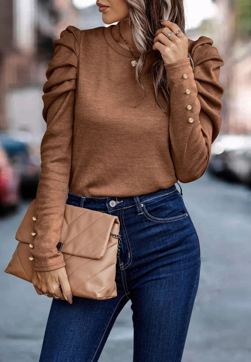 Blusa plisada con mangas gigot