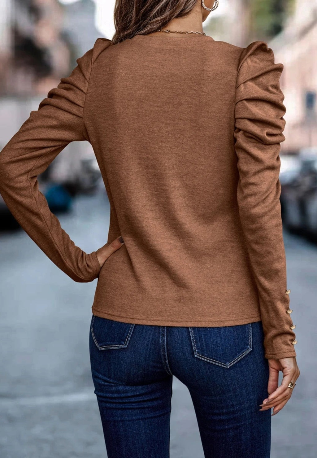 Blusa plisada con mangas gigot