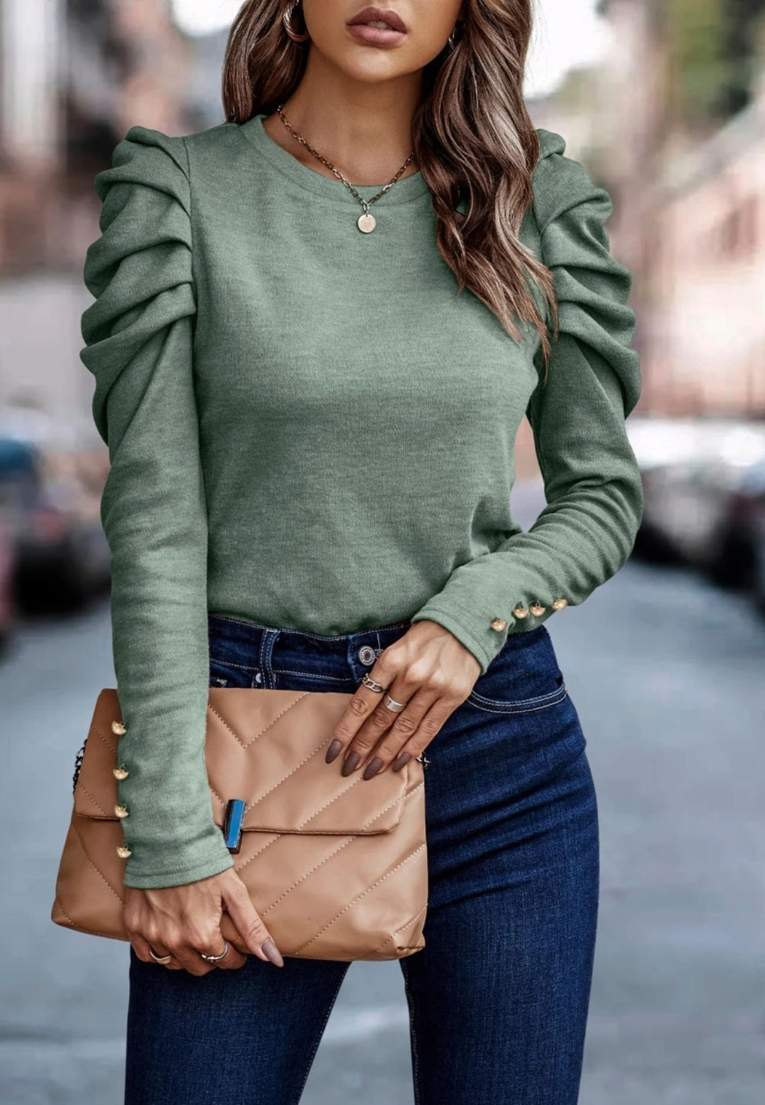 Blusa plisada con mangas gigot