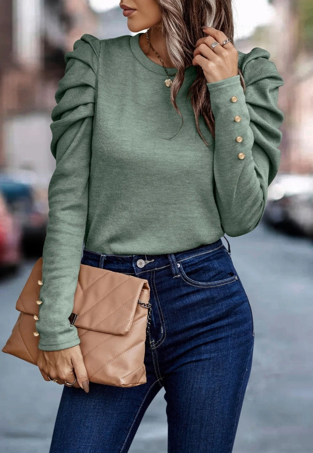 Blusa plisada con mangas gigot