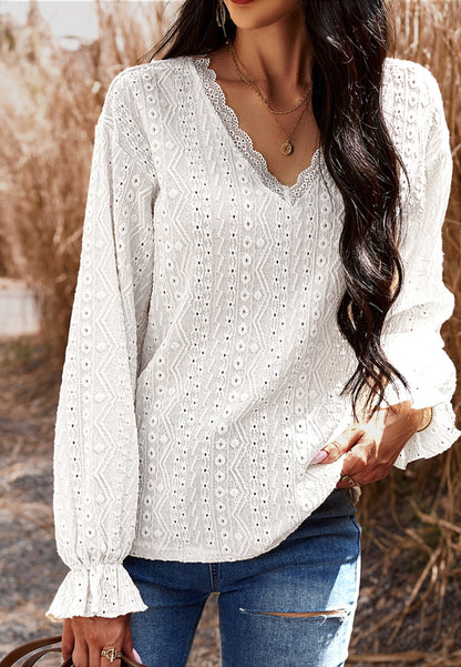 Blusa bordada con tapiz de color liso