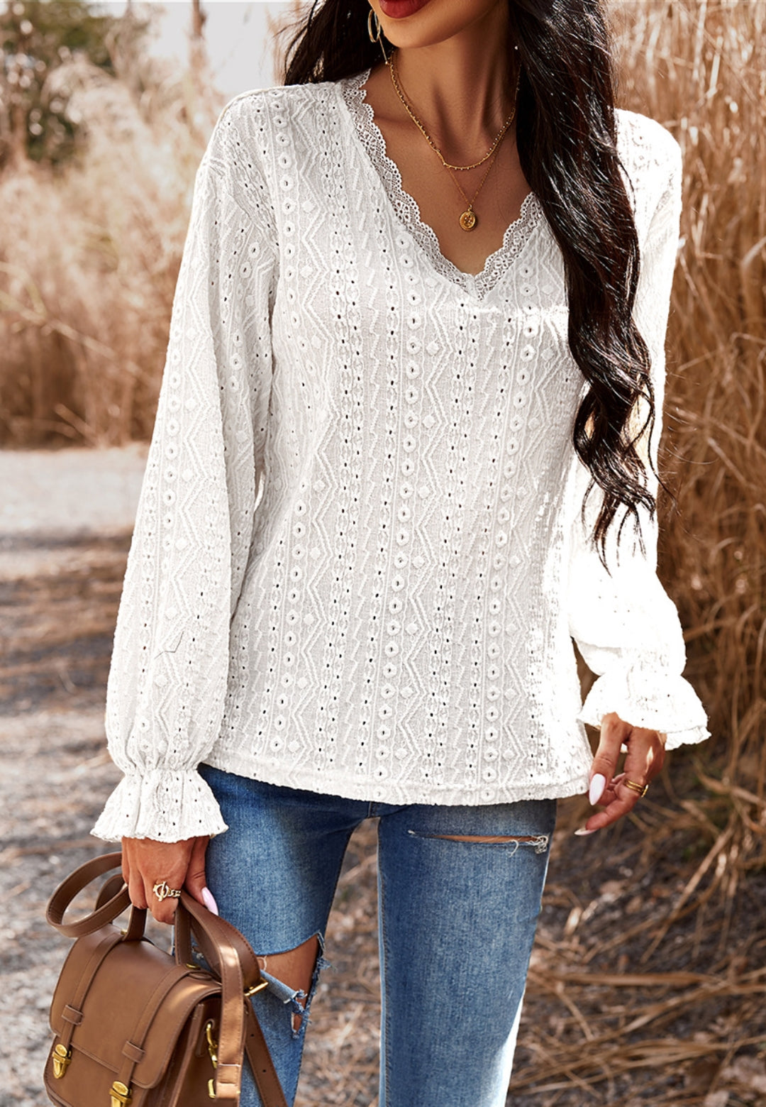 Blusa bordada con tapiz de color liso