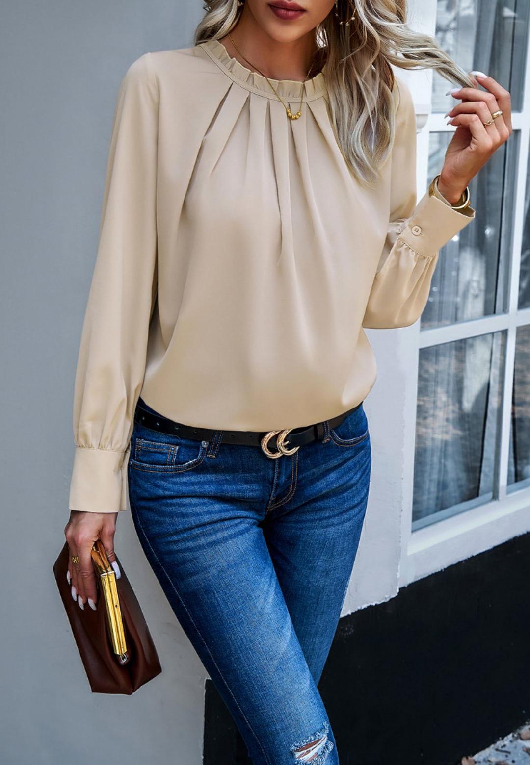 Blusa con cuello redondo y volantes