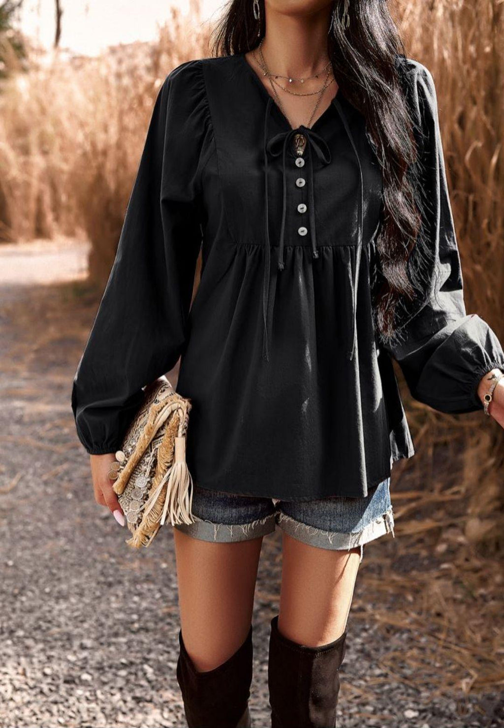 Blusa babydoll con cuello con lazo doble