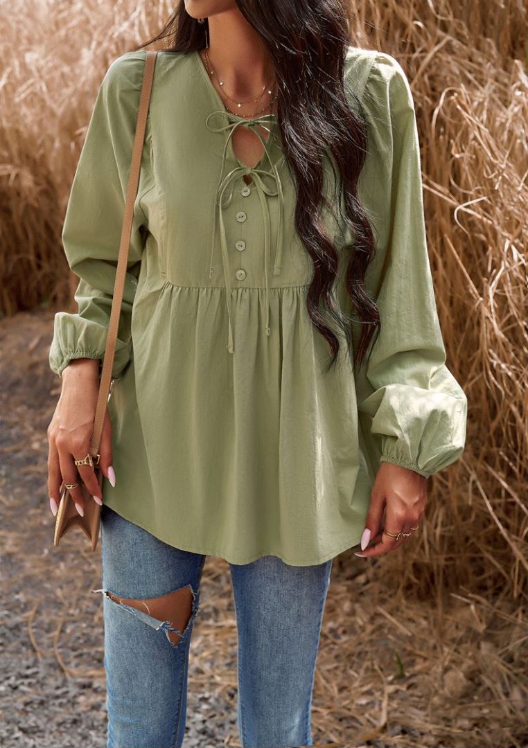 Blusa babydoll con cuello con lazo doble