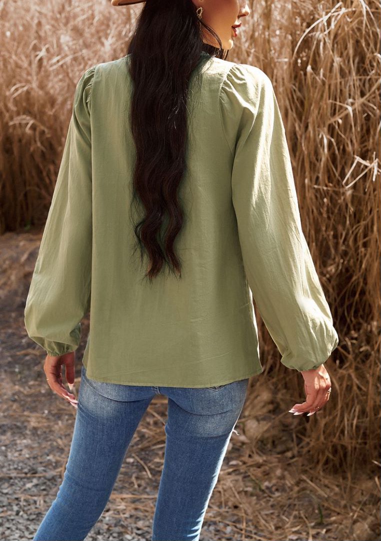 Blusa babydoll con cuello con lazo doble