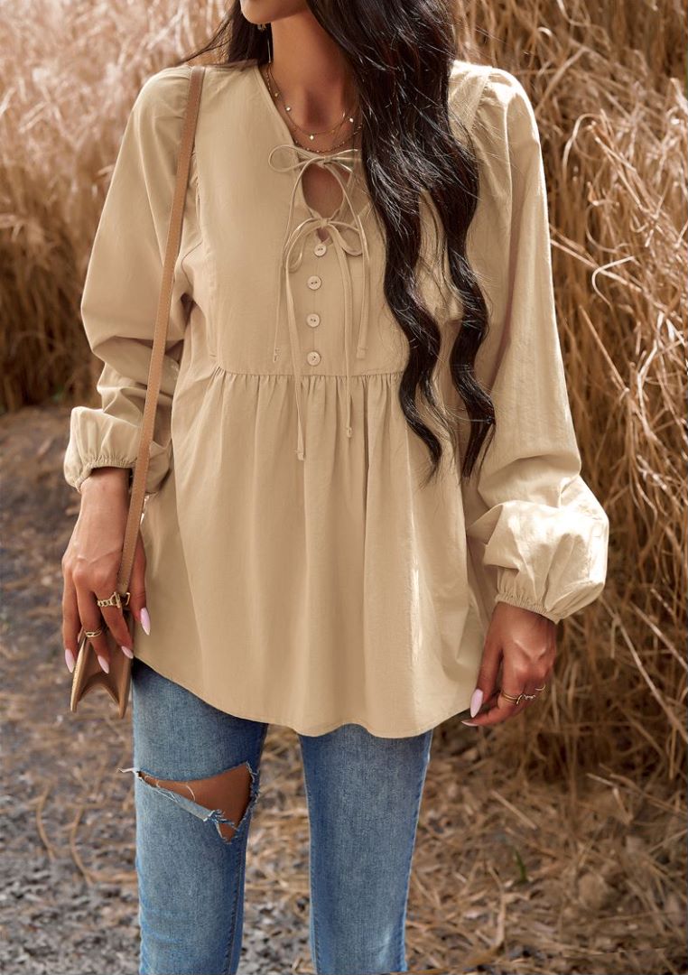 Blusa babydoll con cuello con lazo doble