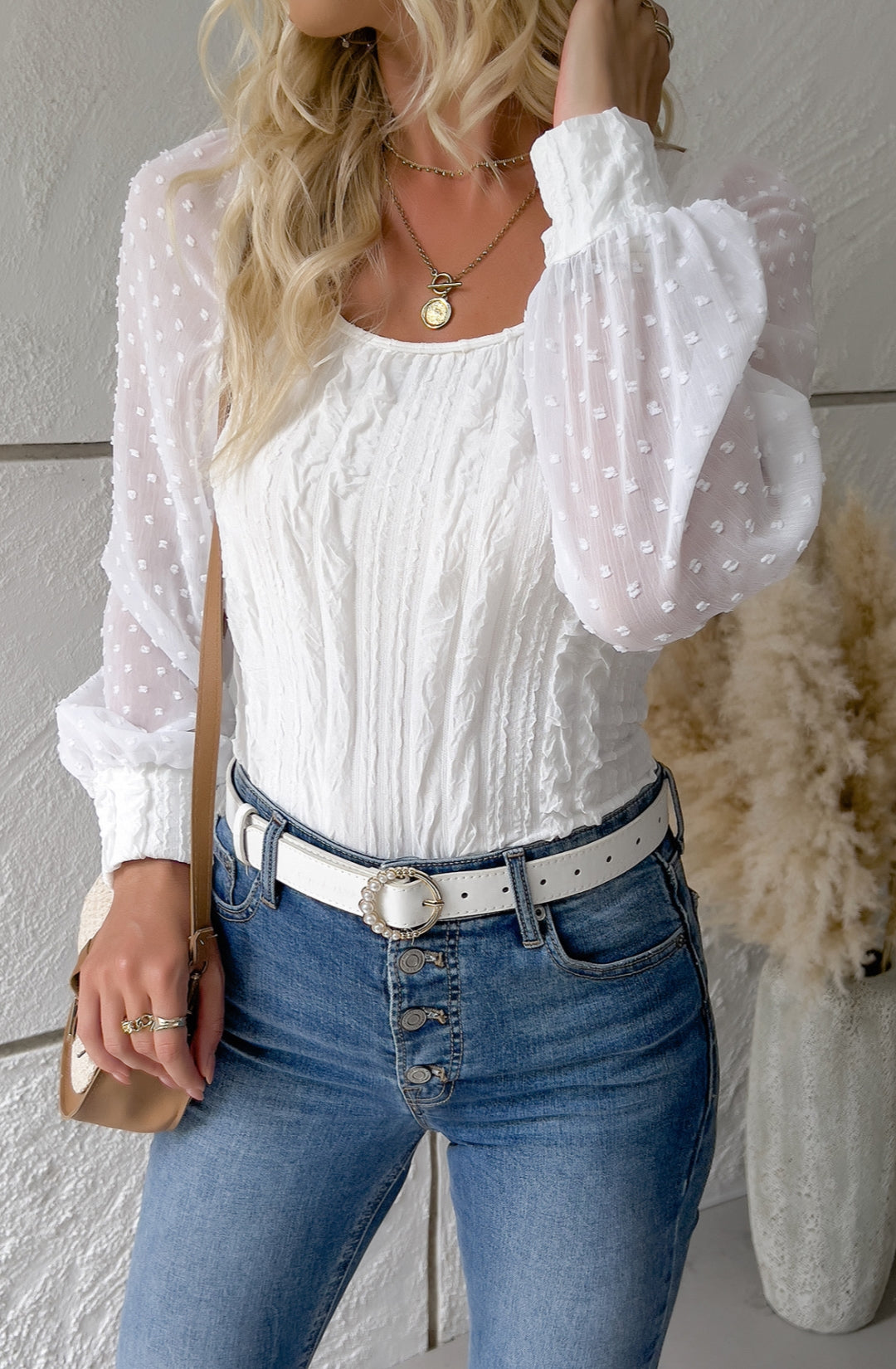 Blusa texturizada de manga larga con lunares transparentes