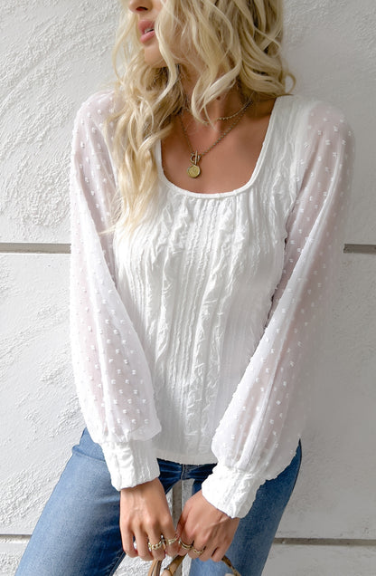 Blusa texturizada de manga larga con lunares transparentes