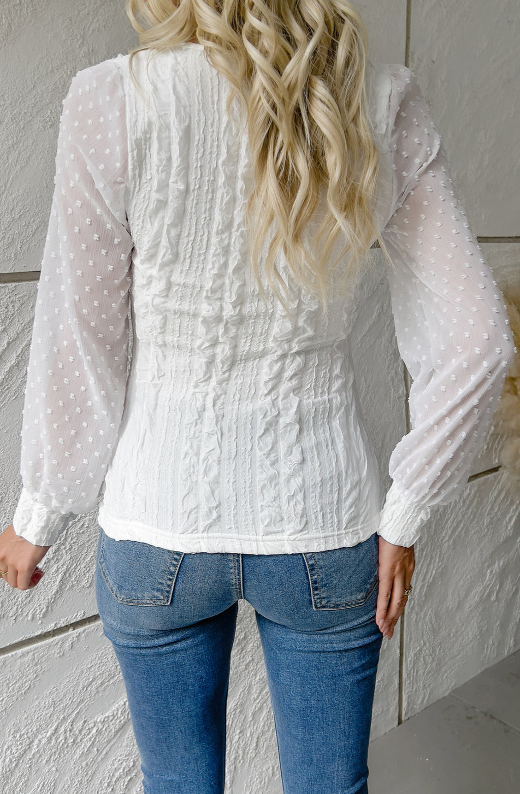 Blusa texturizada de manga larga con lunares transparentes