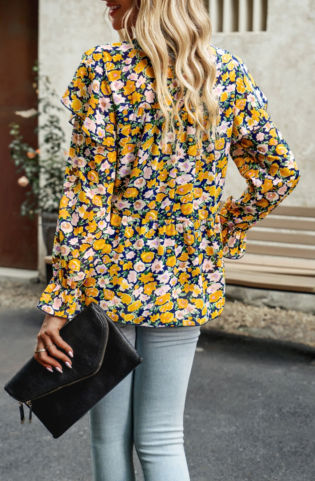 Blusa con volantes en los hombros y estampado de leopardo
