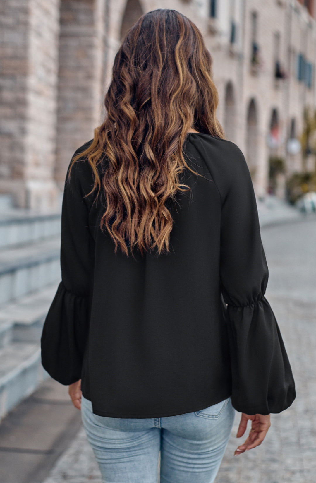 Blusa lisa con mangas abullonadas dobles