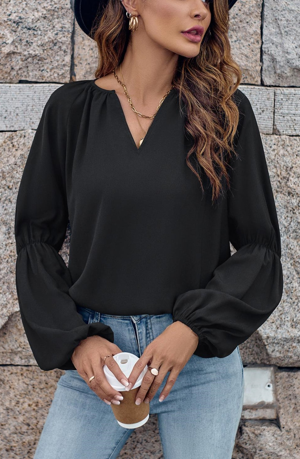 Blusa lisa con mangas abullonadas dobles
