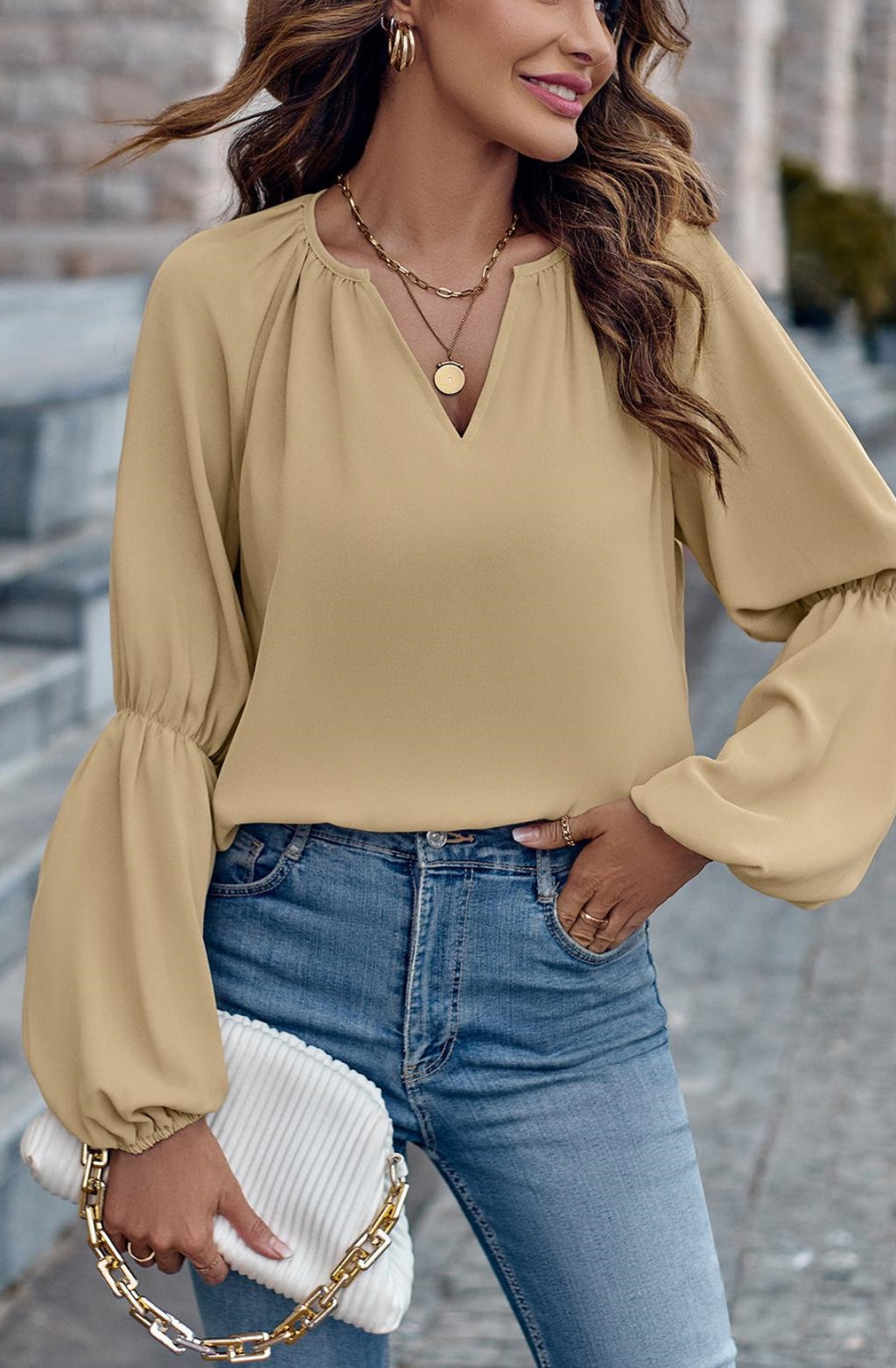 Blusa lisa con mangas abullonadas dobles