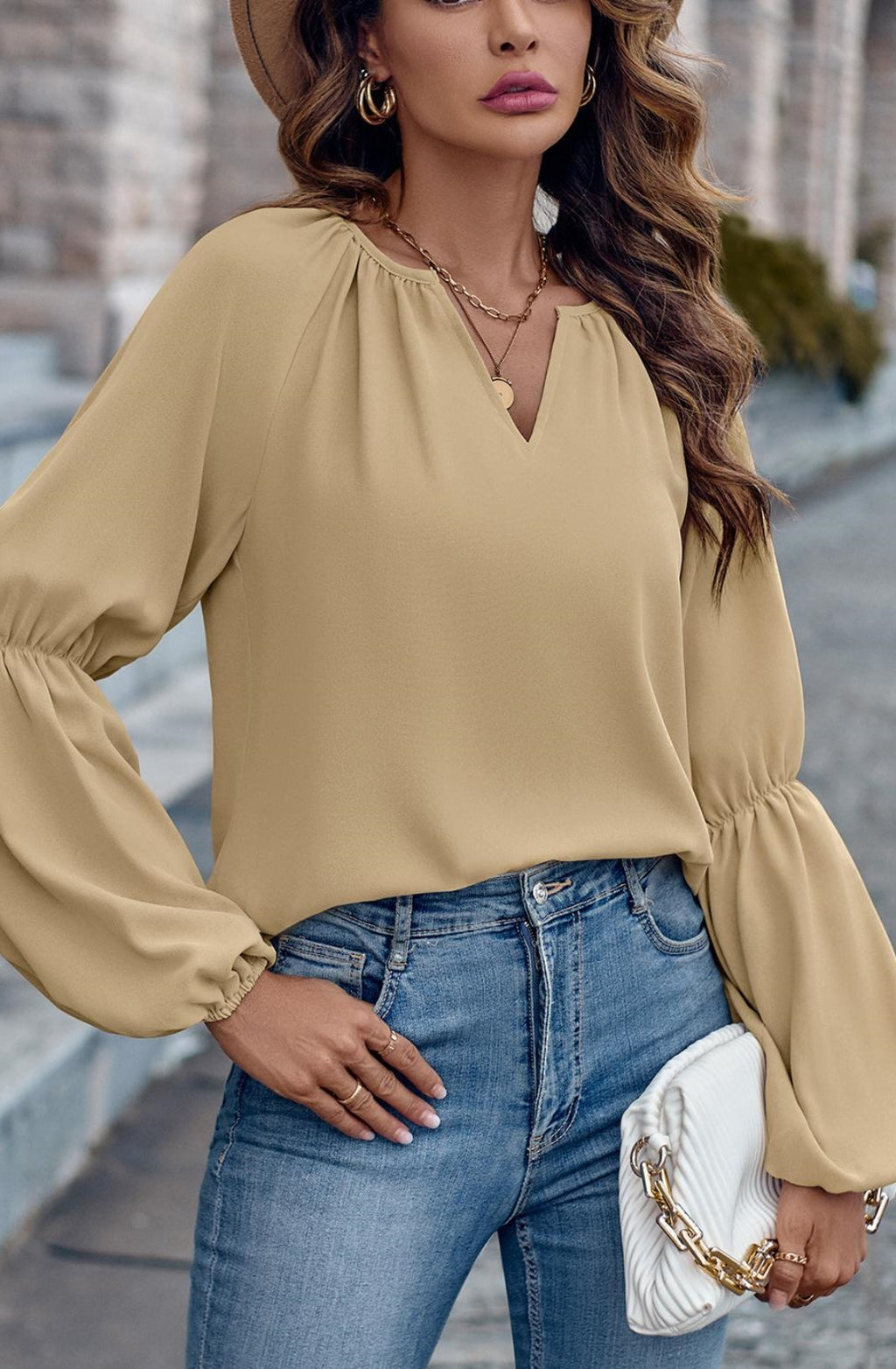 Blusa lisa con mangas abullonadas dobles