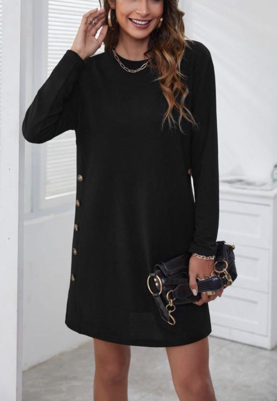 Vestido tipo suéter con detalle de botones laterales