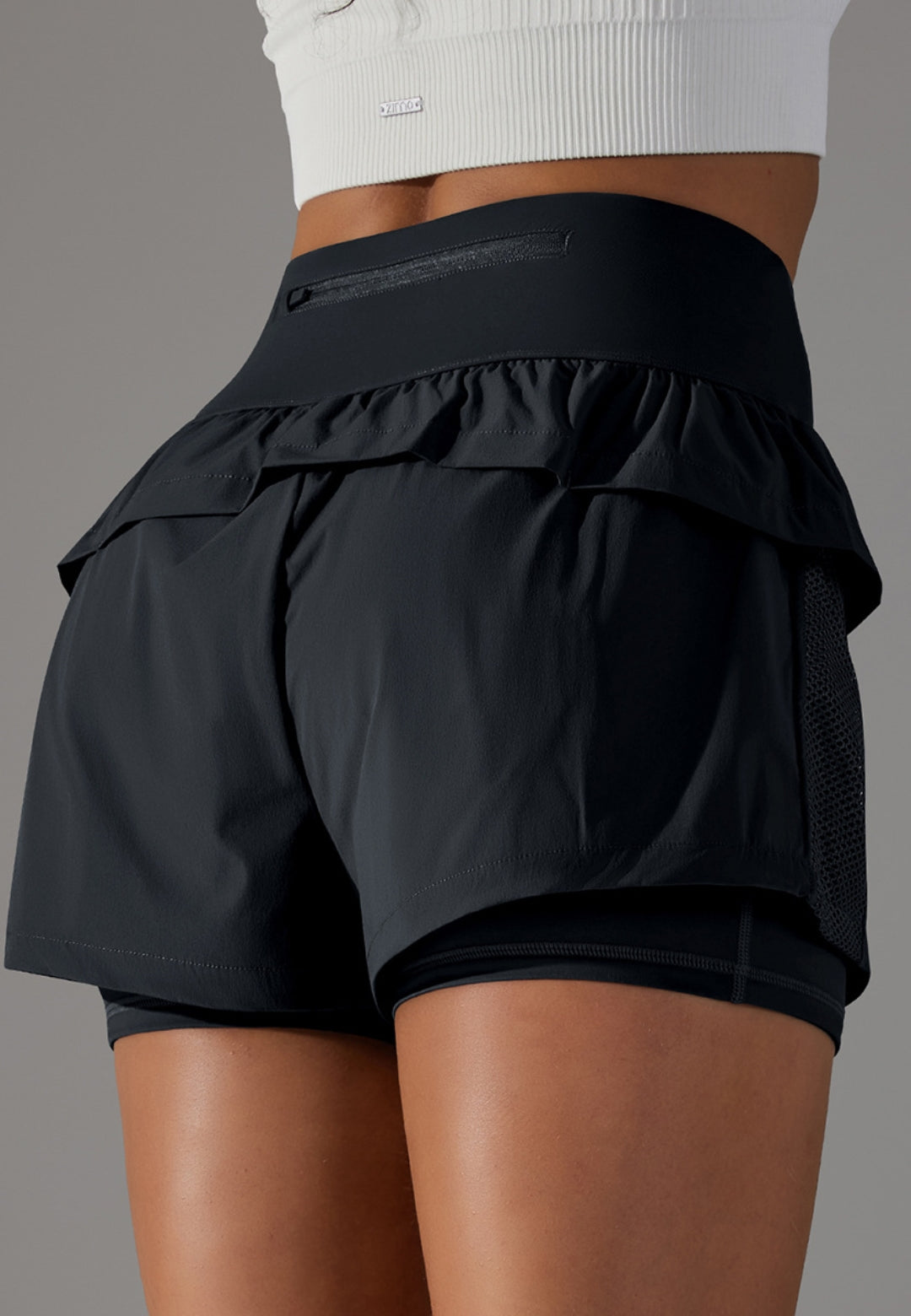 Pantalones cortos con volantes y cintura alta