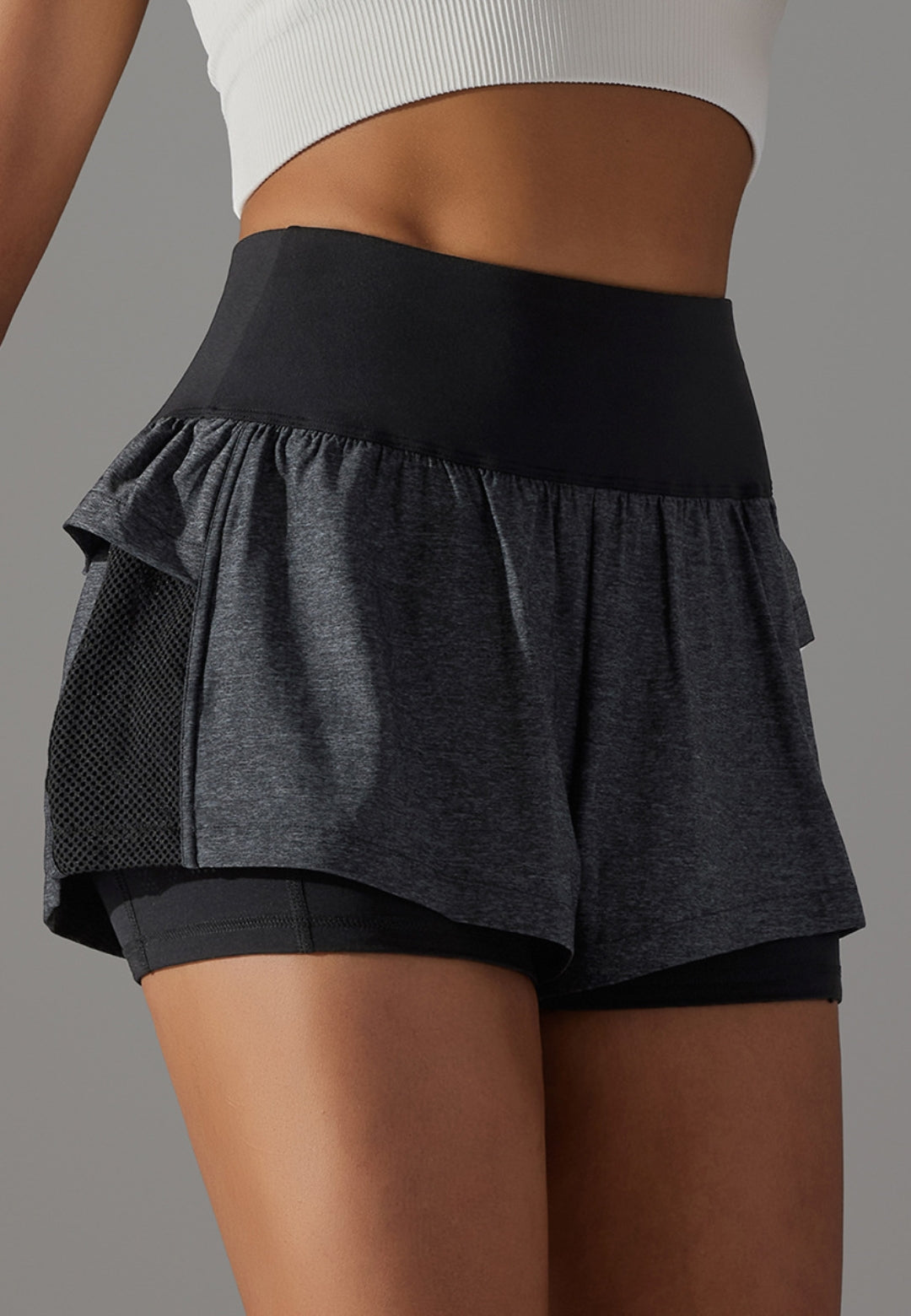 Pantalones cortos con volantes y cintura alta