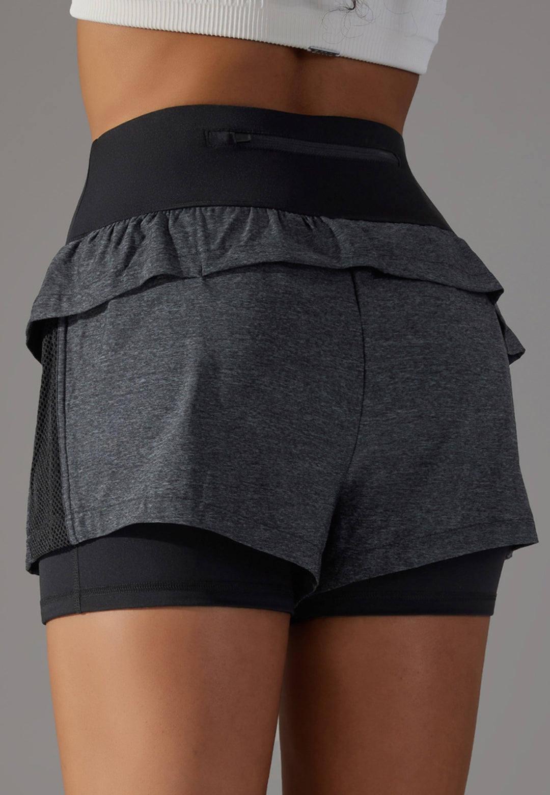 Pantalones cortos con volantes y cintura alta