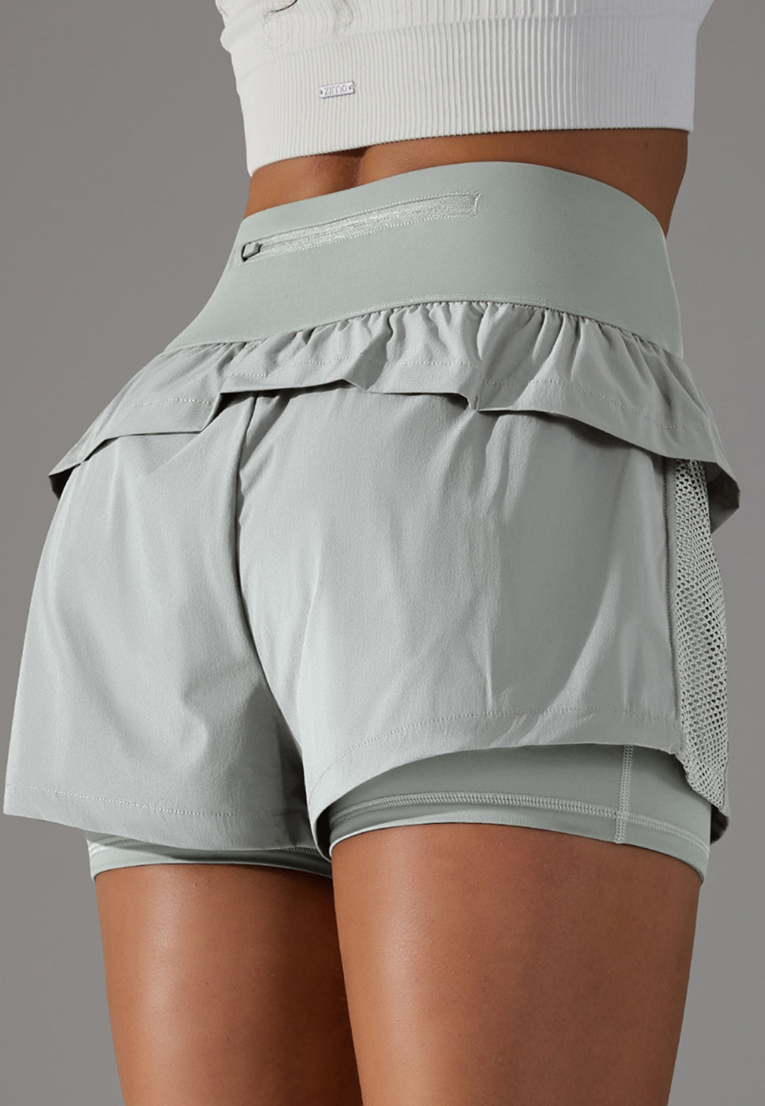 Pantalones cortos con volantes y cintura alta
