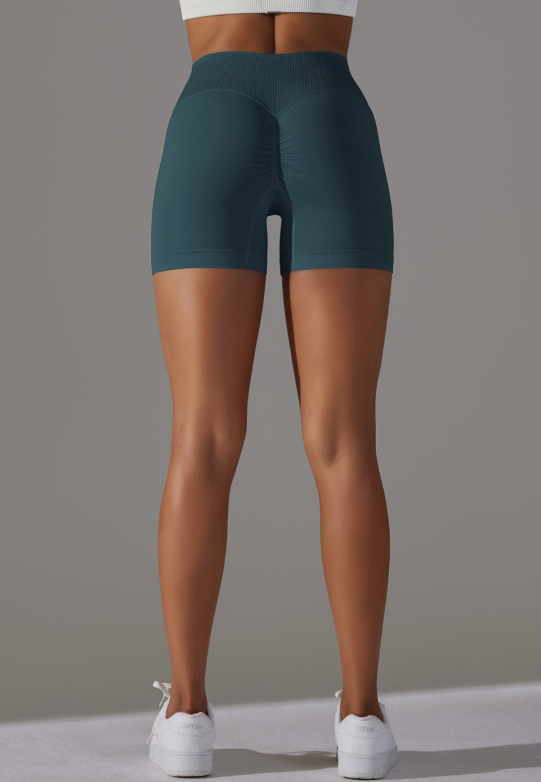 Pantalones cortos con cintura en V y canalé superpuesto