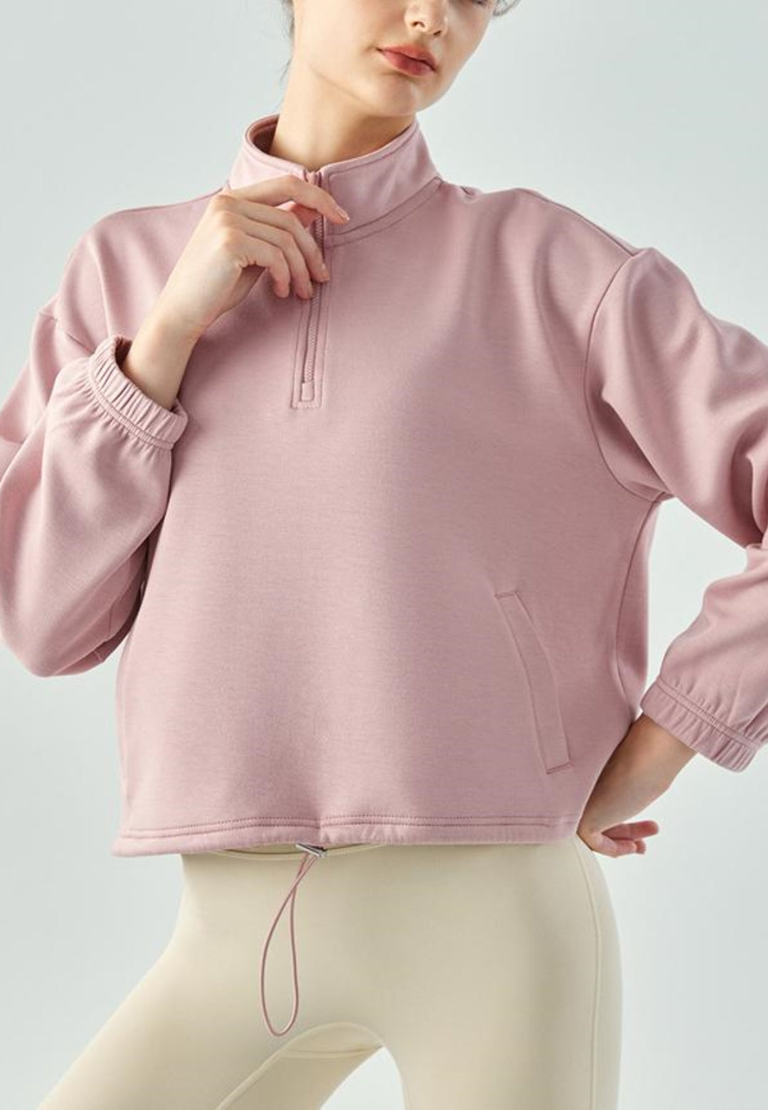 Suéter de cuello alto con dobladillo con cordón ajustable
